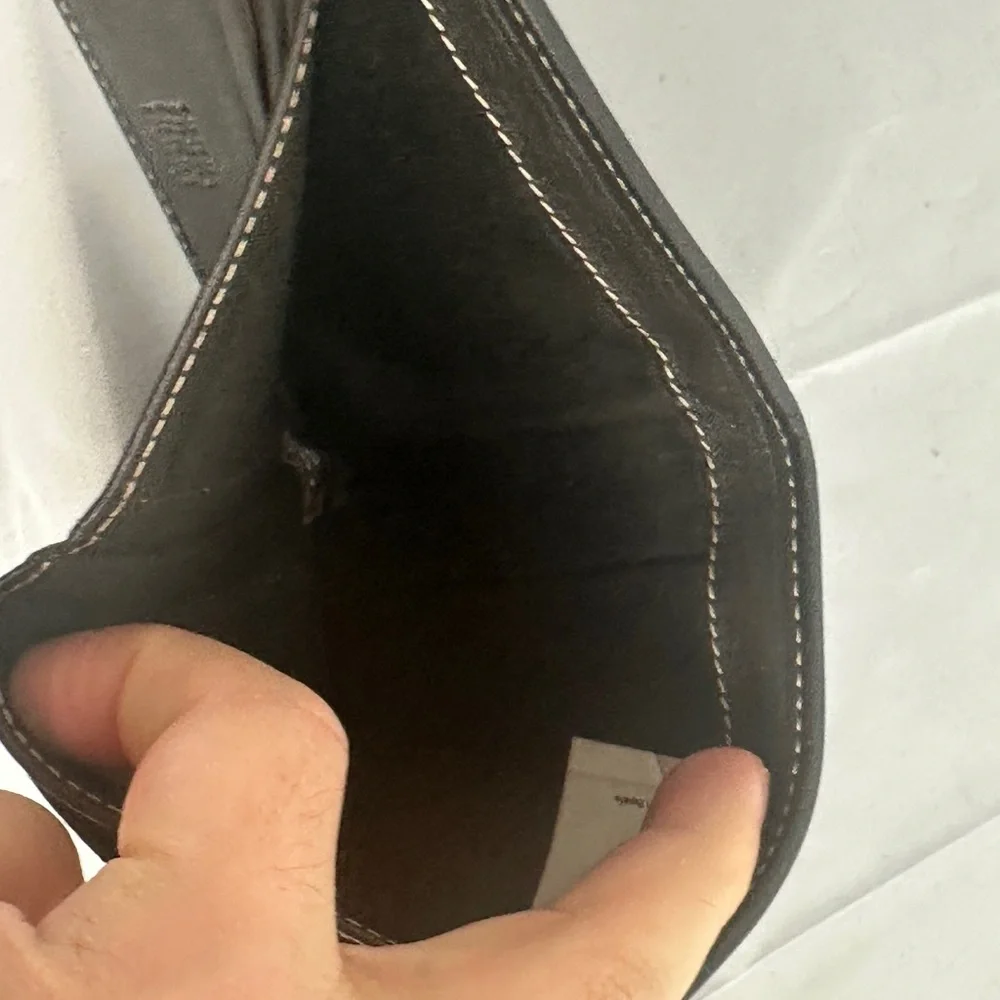 Carolina Herrera bifold canvas and brown leather bi fold wallet
